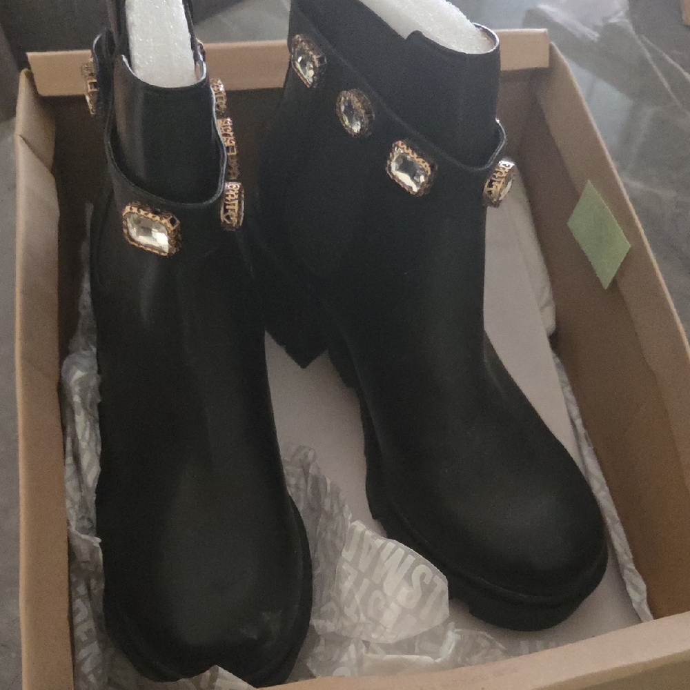 Elegant Black Ankle Boots with Gold Accents
